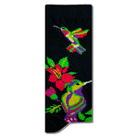 Colibrí entre flores